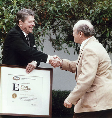 President Ronald Reagan presents Harold Godbersen with the “E Star” Award in a special ceremony on the White House lawn in Washington, D.C.
