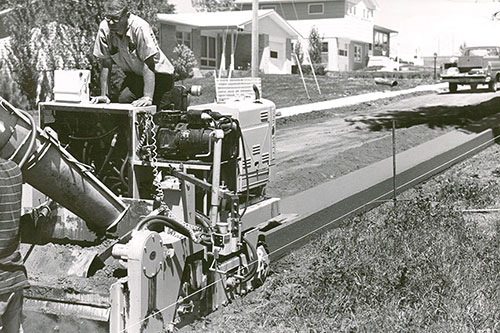 First production prototype two-track curb and gutter machine