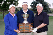 Austin Page of Blanchard Machinery, R.J. Bumann of GOMACO, and Bill Sweetser of Sweetser Construction Company