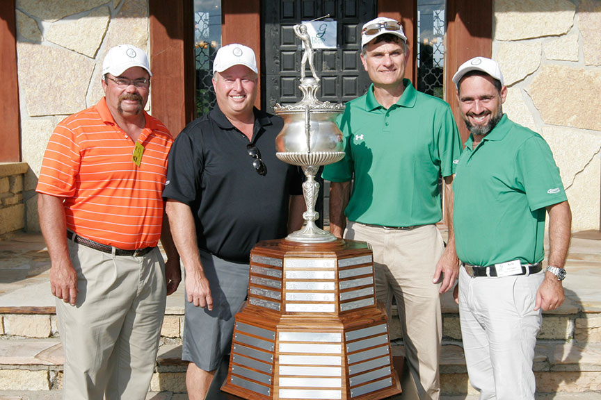Ida Grove Champions - Tim Rife of Luxa Construction Co., Grant Godbersen of GOMACO Corporation, Murray Lodge of TOPCON, and Ken Singer of Heavy Equipment Guide Magazine