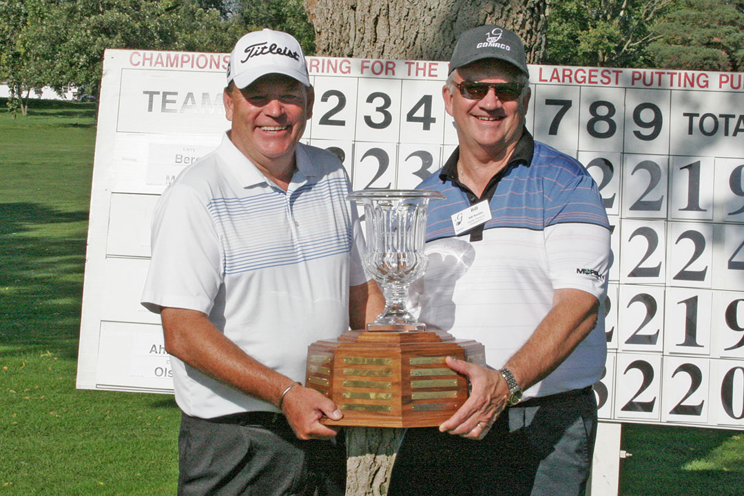 Putting Champions - Steve Baker of Baker Concrete and Exc., and Bill Buckles of Murphy Tractor & Equipment Co.