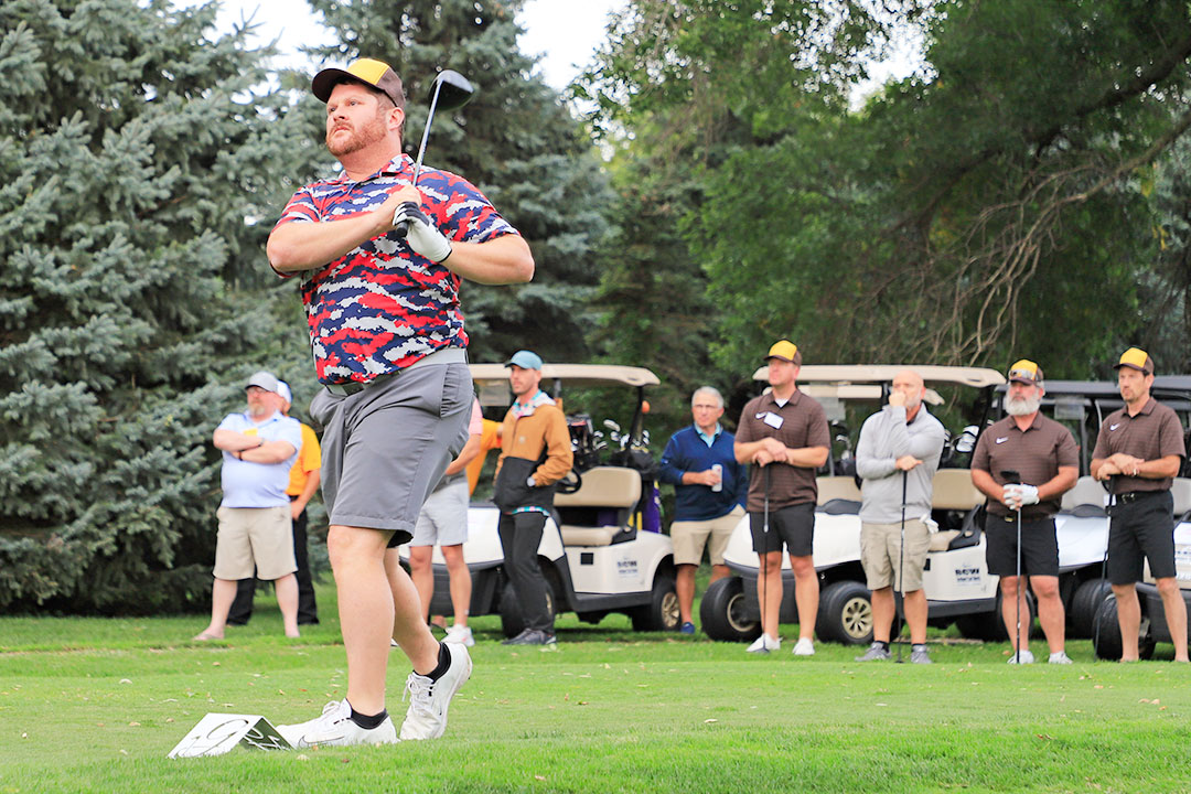 Joe Schmidtlein of the Rasmussen Group was on the Scramble Tournament championship team from the Holstein course, and also was on the third place team in the Contractors’ Shoot-Out.