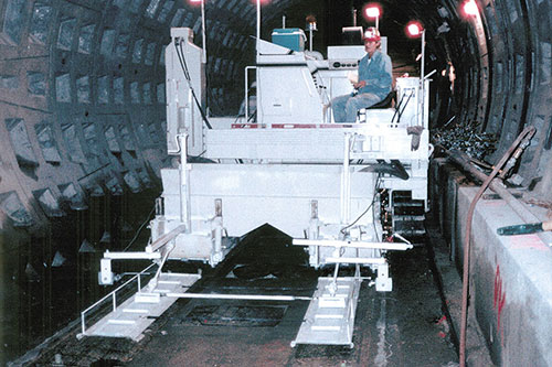 Commander II slipforming rail pads in tunnels