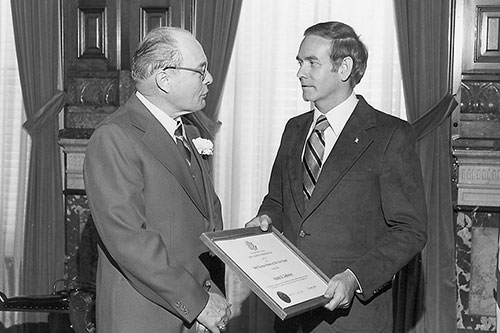 Governor Robert Ray presents Harold Godbersen with the 1979 Iowa Small Business Person of the Year Award