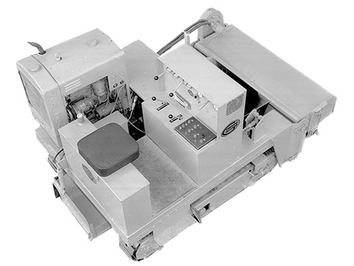 First production prototype two-track curb and gutter machine with trimmerhead