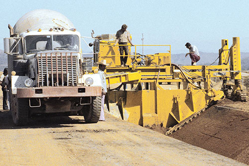 Prototype TP-165 canal trimmer/slipform paver