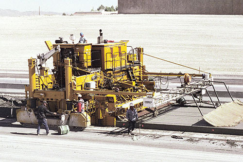 First In-The-Pan Dowel Bar Inserter (IDBI) on a two-track GP-4000 paver